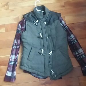 Vest and plaid shirt